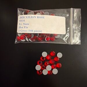 Swarovski • Color: Lt. Siam, 2028 XILION Rose Hotfix Rhinestones